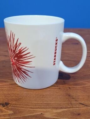 Starbucks White Mug with Red Burst Design